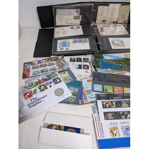 339 - A quantity of special issues 1st day covers, Victorian stamped postal envelopes, coin stamp sets and... 