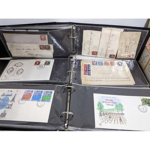 339 - A quantity of special issues 1st day covers, Victorian stamped postal envelopes, coin stamp sets and... 