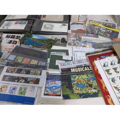 339 - A quantity of special issues 1st day covers, Victorian stamped postal envelopes, coin stamp sets and... 