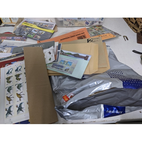 339 - A quantity of special issues 1st day covers, Victorian stamped postal envelopes, coin stamp sets and... 