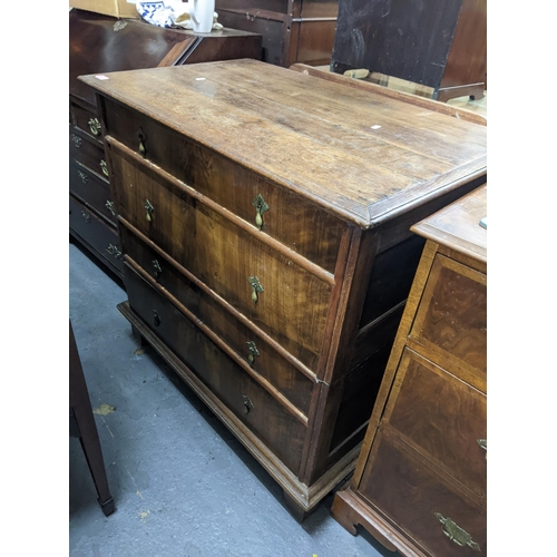 500 - An early 20th century four drawer dressing chest with an oak carcass and flame mahogany drawers with... 