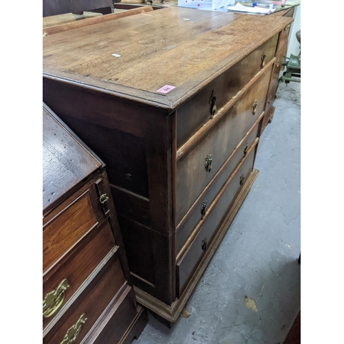 500 - An early 20th century four drawer dressing chest with an oak carcass and flame mahogany drawers with... 