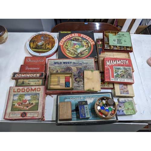 300 - A collection of vintage puzzles and games to include Wild West Shooting game, The Dover Patrol, Wadd... 