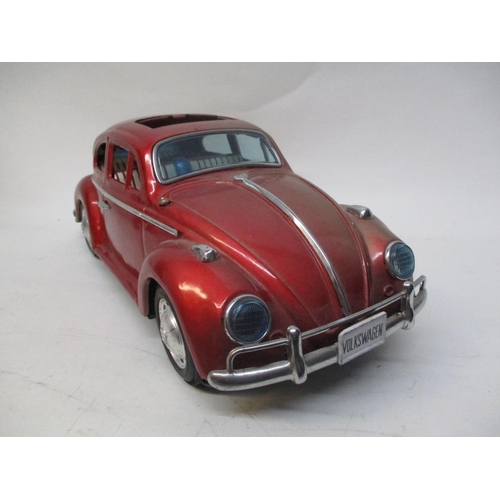 530 - A 1960s Bandai Japanese large scale tinplate Volkswagen Beetle, 5 1/4