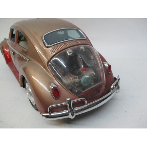 530 - A 1960s Bandai Japanese large scale tinplate Volkswagen Beetle, 5 1/4