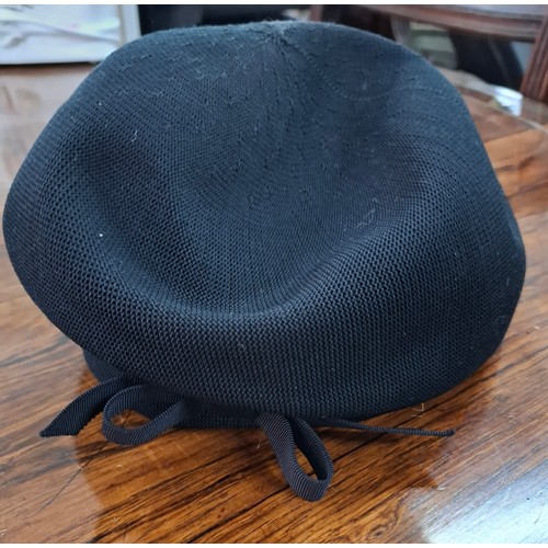 50 - A group of 4 mid 20th Century and later hats to include a Sandra Phillipps navy felt and velvet hat,... 