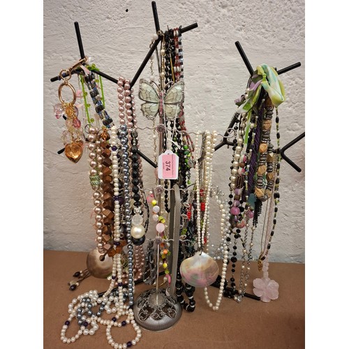 374 - A collection of mainly bead necklaces and High Street jewellery to include modern simulated and cult... 