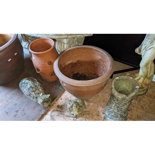 377 - Mixed garden items to include a stoneware statue, terracotta pots and other items Location: DH
If th... 