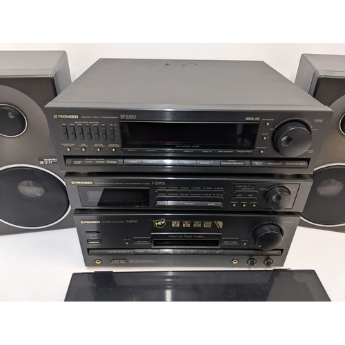 215 - A Pioneer SPZ570 amplifier, a Z570L tuner, a AZ470 CD player, a PLZ470 turntable and a pair of Techn... 