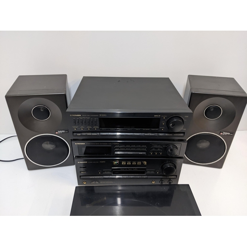 215 - A Pioneer SPZ570 amplifier, a Z570L tuner, a AZ470 CD player, a PLZ470 turntable and a pair of Techn... 