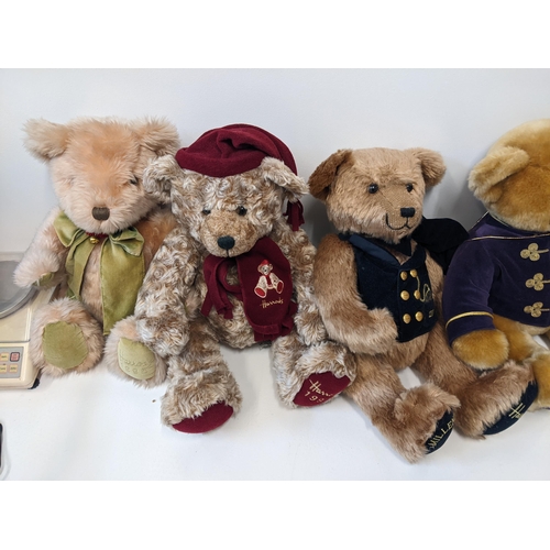 235 - A group of seven Harrods teddy bears to include years 1995, 1999, Millennium bears and years 2001, 2... 