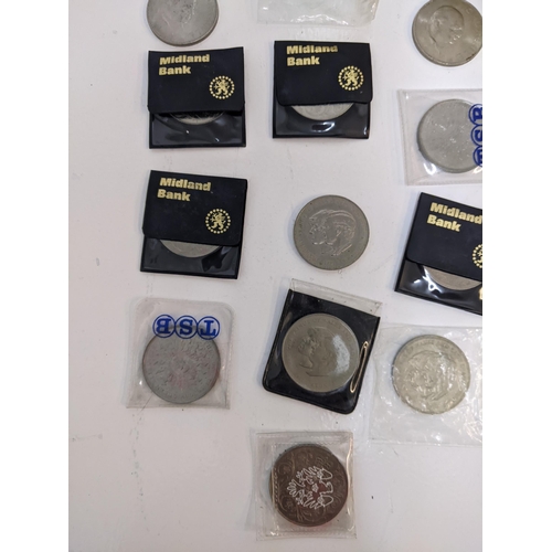 242 - A collection of coins to include various post WWII British circulated shillings, two shilling pieces... 