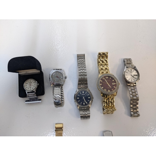 243 - A collection of wristwatches to include two gents Seiko examples, a gents Citizen example and an Ing... 