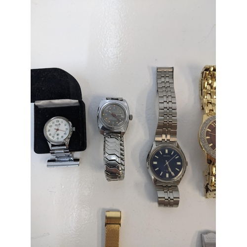 243 - A collection of wristwatches to include two gents Seiko examples, a gents Citizen example and an Ing... 