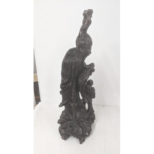 248 - An early 20th century Chinse treen carved figure of Shou Lao and Child
Location: 9.2
If there is no ... 