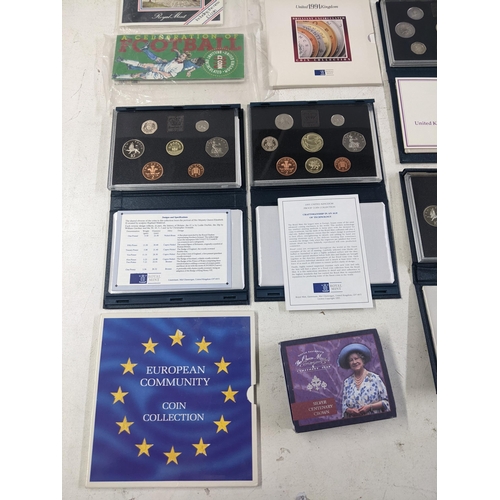 261 - A collection of uncirculated coins to include examples from the millennium, from 1983, 1991, 1999 an... 