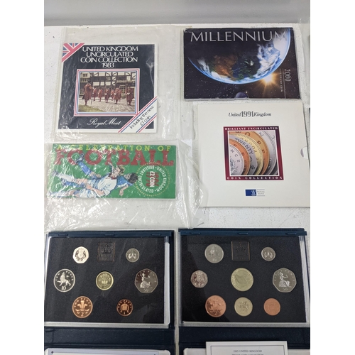 261 - A collection of uncirculated coins to include examples from the millennium, from 1983, 1991, 1999 an... 