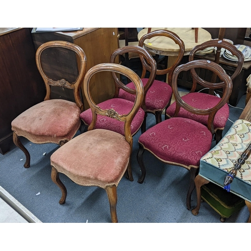 299 - A matched set of six Victorian balloon back dining chairs to include a pair of walnut examples 
Loca... 