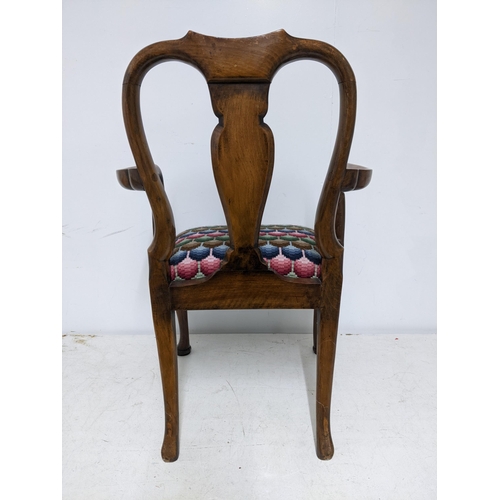 358 - An early 20th century walnut child's armchair upholstered drop-in seat on shell knee carved cabriole... 