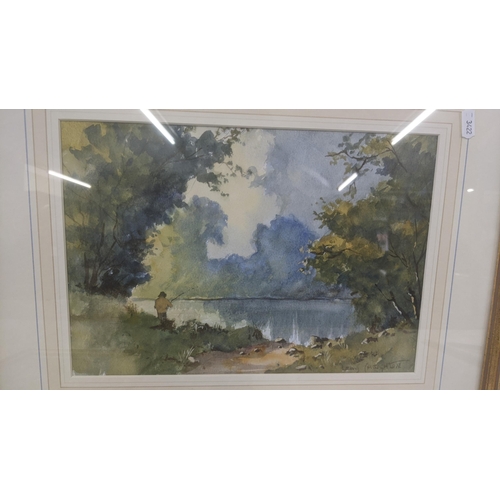 416 - Three framed and glazed paintings to include a watercolour depicting a lake scene and a man fishing,... 