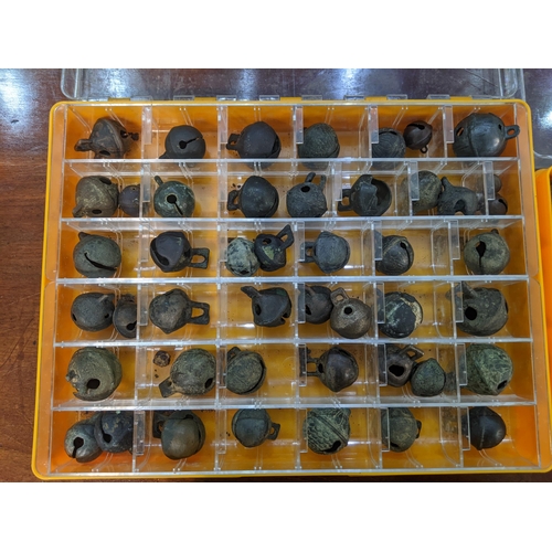 447 - A large collection of crotal bells other metal detector finds and associated items
Location: 4.2
If ... 