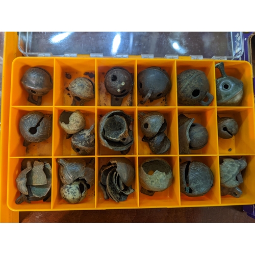 447 - A large collection of crotal bells other metal detector finds and associated items
Location: 4.2
If ... 