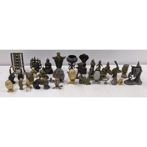 449 - A collection of metal figures and animals including a Chinese bronze figure of an elder, Tibetan Bud... 