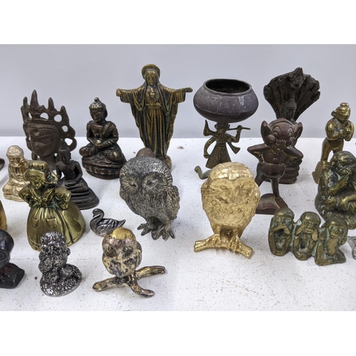 449 - A collection of metal figures and animals including a Chinese bronze figure of an elder, Tibetan Bud... 