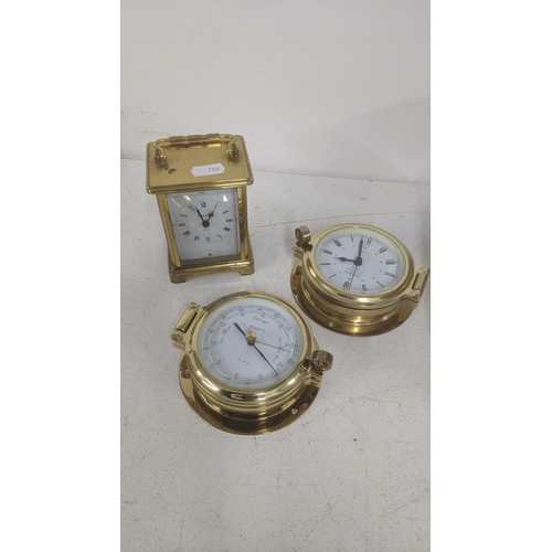 457 - A mixed lot to include a brass cased 8-day carriage clock together with two brass cased Wempe Schiff... 