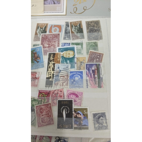 459 - A quantity of world stamp albums and loose examples to include commonwealth examples, Chinese, Frenc... 