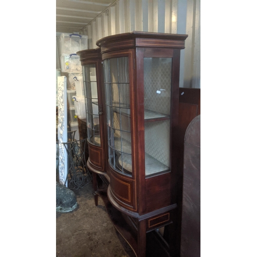 462 - An Edwardian mahogany bow fronted display cabinet having two lead glazed doors, 168.5cm h x 122cm w ... 