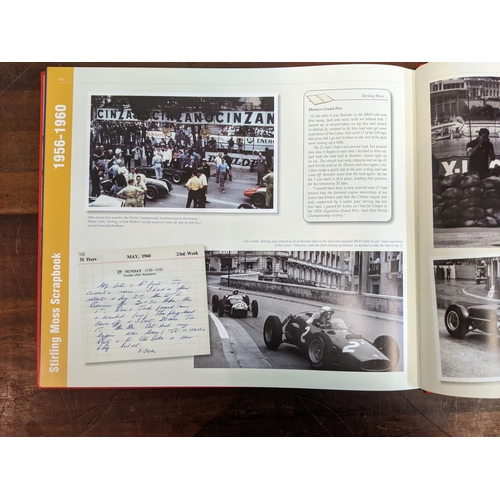 493 - A Stirling Moss scrapbook 1956-1960 by Stirling Moss & Phillip Porter in a protective red sleeve
Loc... 