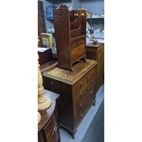 504 - An early 20th century five drawer mahogany dressing chest with a protective glass layer along with a... 