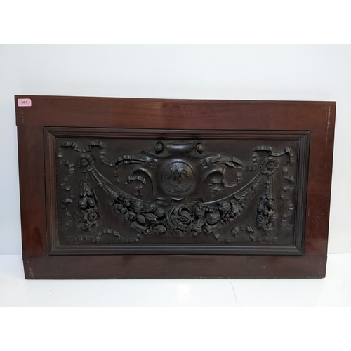 381 - A mid century mahogany panel with an ornate carving for the Imperial Tabaco Company that was display... 