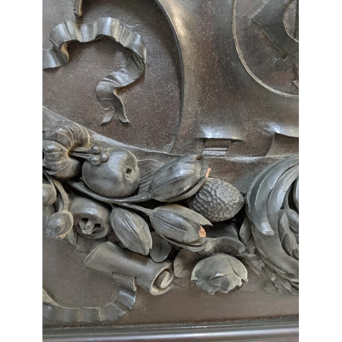 381 - A mid century mahogany panel with an ornate carving for the Imperial Tabaco Company that was display... 