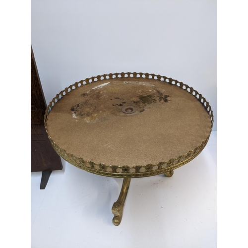 386 - A composite marble effect circular table with a galleried top, along with an early 20th century depi... 