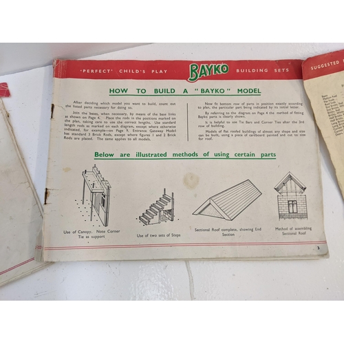 387 - A Bayko building set with catalogues showing possible assembly structures 
Location:GL
If there is n... 