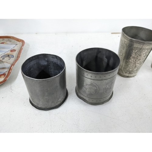 520 - Three Chinese pewter items, cups and tobacco box
Location:1.5
If there is no condition report shown,... 