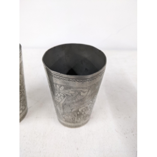 520 - Three Chinese pewter items, cups and tobacco box
Location:1.5
If there is no condition report shown,... 