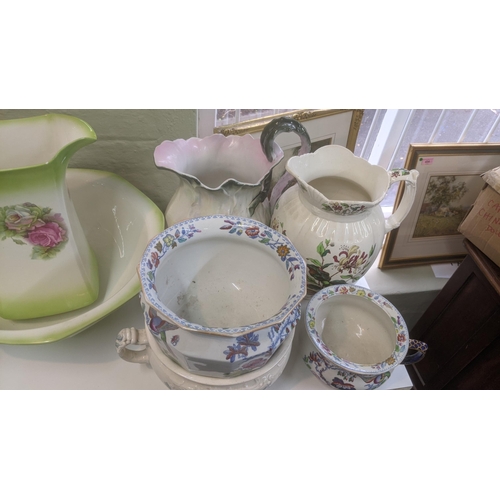 548 - Victorian and later ceramics to include two wash bowls and jugs, a lustre jug and Masons Ironstone c... 