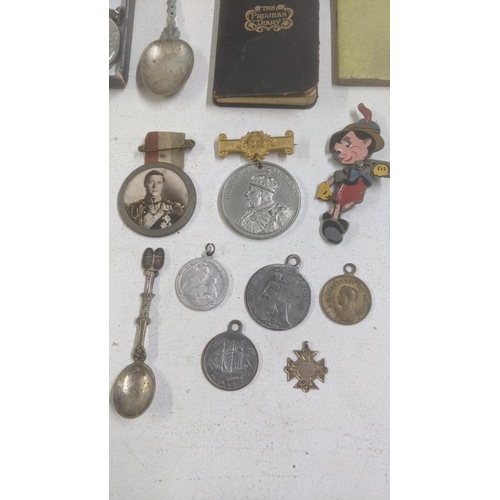 554 - Mixed collectables to include a Victorian Police whistle, two silver thimbles, a silver proof one-po... 