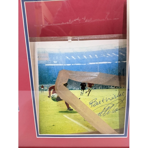 558 - Two England football 1966 World Cup related items to include a World Cup print of a photo, and a Wem... 