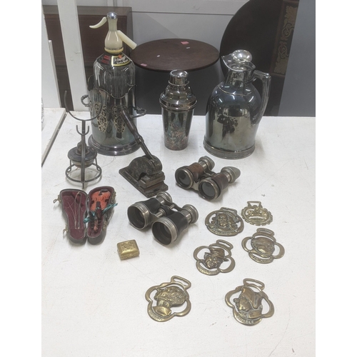 599 - A mixed lot of silver plated items and metalware to include a brandy glass warmer, cast iron letter ... 