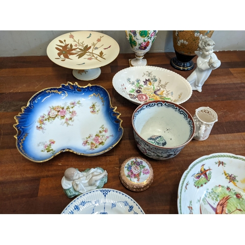 284 - A mixed lot of ceramics to include a 19th century French hand painted vase, two Lladro figures, a Li... 