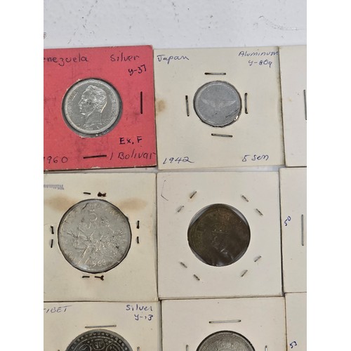 58 - Mixed coins from around the world to include, British India examples George VI Rupee's, Venezuela Si... 