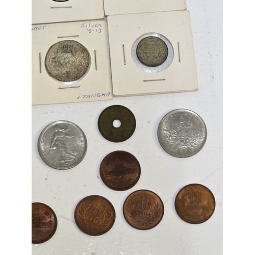 58 - Mixed coins from around the world to include, British India examples George VI Rupee's, Venezuela Si... 