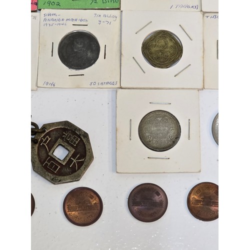 58 - Mixed coins from around the world to include, British India examples George VI Rupee's, Venezuela Si... 