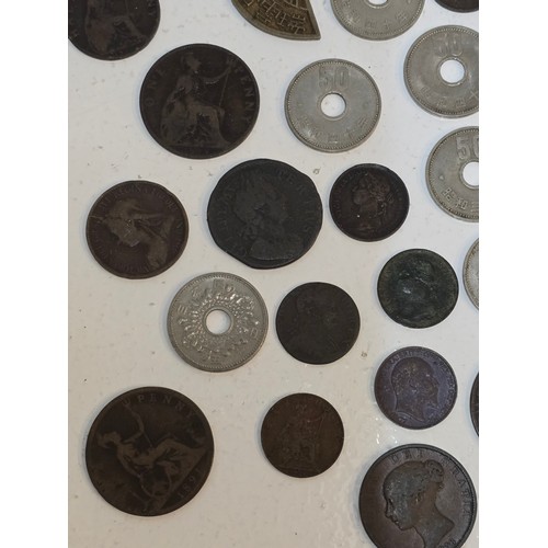 63 - Mixed World coins to include William III, George I, II, III, IV, William IV, and Victorian copper co... 