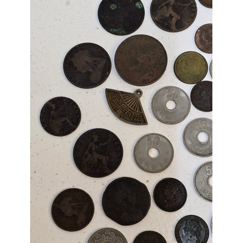 63 - Mixed World coins to include William III, George I, II, III, IV, William IV, and Victorian copper co... 