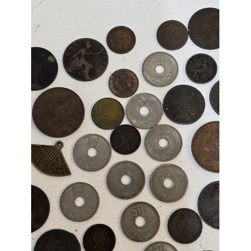 63 - Mixed World coins to include William III, George I, II, III, IV, William IV, and Victorian copper co... 